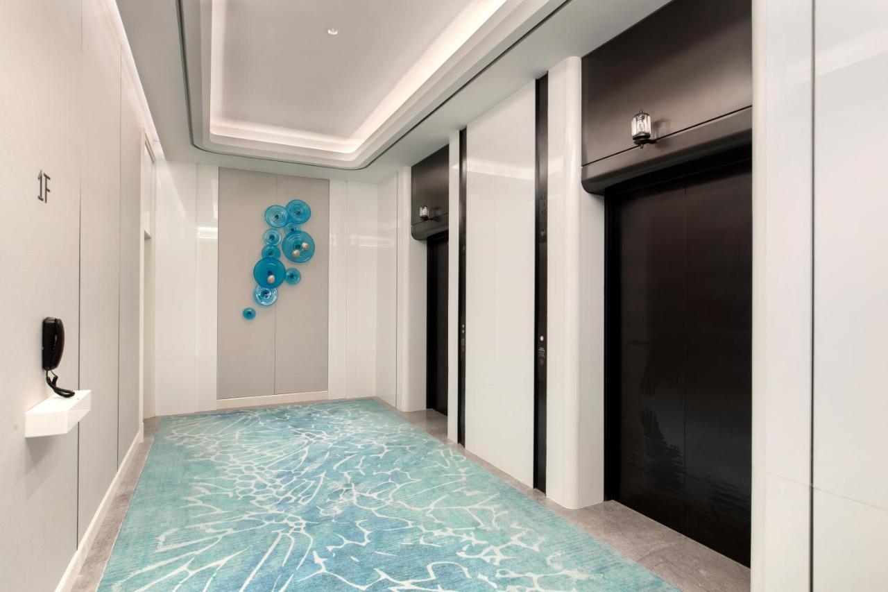 Xiamen International Seaside Hotel -Hotel Corridor Leads To The Stone Exhibition Hall Luaran gambar