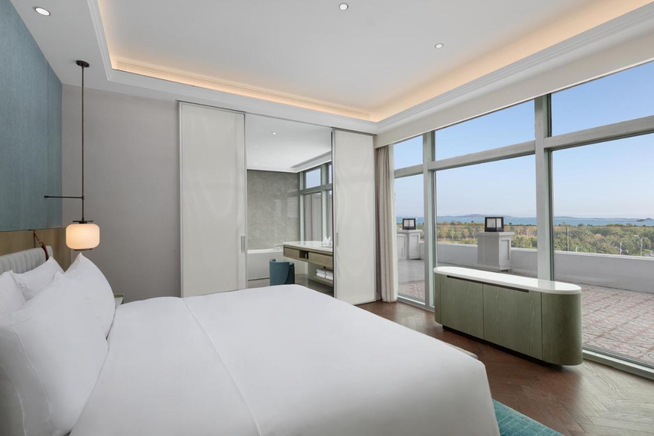 Xiamen International Seaside Hotel -Hotel Corridor Leads To The Stone Exhibition Hall Luaran gambar