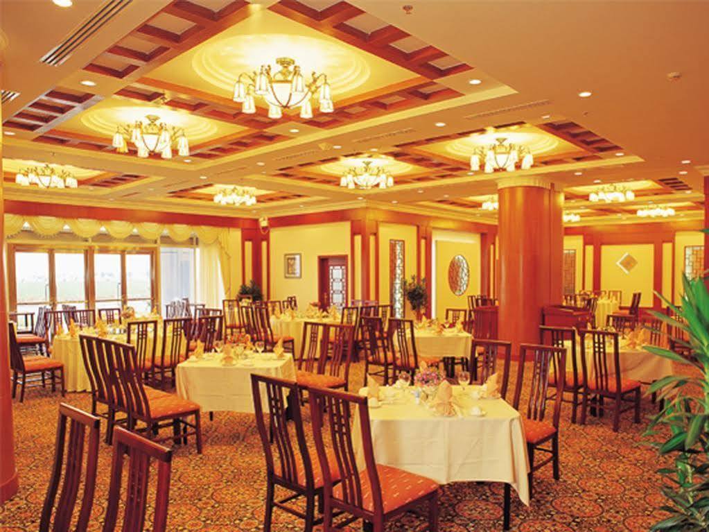 Xiamen International Seaside Hotel -Hotel Corridor Leads To The Stone Exhibition Hall Luaran gambar